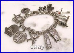 Sterling Silver Charm Bracelet with 13 Misc. Charms 7-1/2 63g 9-H496