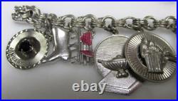 Sterling Silver Charm Bracelet with 13 Misc. Charms 7-1/2 63g 9-H496