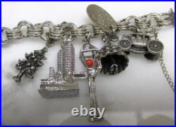 Sterling Silver Charm Bracelet with 13 Misc. Charms 7-1/2 63g 9-H496