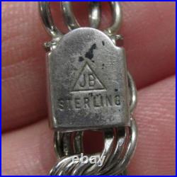 Sterling Silver Charm Bracelet with 13 Misc. Charms 7-1/2 63g 9-H496