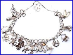 Sterling Silver Hallmarked Charm Bracelet 42 Grams Church Horseshoe Dove Teddy