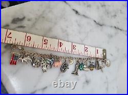 Sterling silver Charm Bracelet with 16 Charms 9 are Sterling