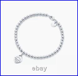 Sterling silver Tiffany & Co beaded bracelet with love heart Charm