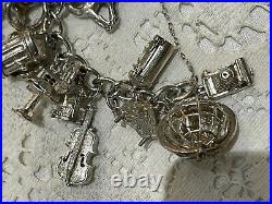 Stunning heavy vintage sterling silver charm bracelet & nuvo etc opening charms