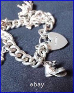 Stunning vintage solid silver 925 charm bracelet With 6 charms 59.3g