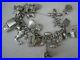 Stunning-vintage-solid-silver-charm-bracelet-23-charms-135gms-01-af