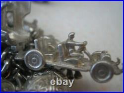 Stunning vintage solid silver charm bracelet 23 charms. 135gms