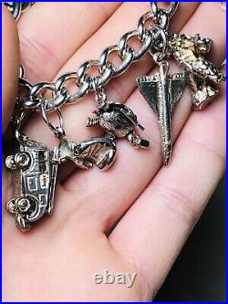 Stunning vintage solid silver charm bracelet charms. Rare, open, move