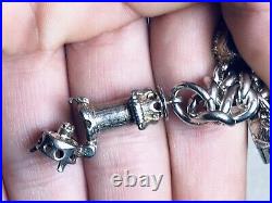 Stunning vintage solid silver charm bracelet charms. Rare, open, move