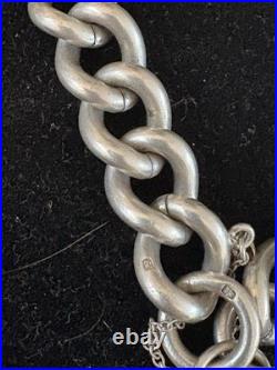 Superb vintage sterling silver 925 charm bracelet Hallmarked