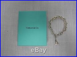 TIFFANY + CO. 925 STERLING SILVER 7 CHARM BRACELET With SAILBOAT CHARM With BOX