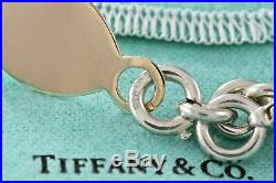 Tiffany & Co. 14Kt. Gold Vintage Oval Tag ID A4440' Charm Silver 7.5 Bracelet