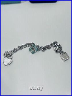 Tiffany & Co. 925 sterling silver charm bracelet with 3 charms RARE