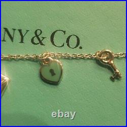 Tiffany & Co. Dangle charm bracelet. New. Silver