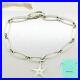 Tiffany-Co-Elsa-Peretti-Sterling-Silver-6-5-Starfish-Charm-Bracelet-with-Pouch-01-abf