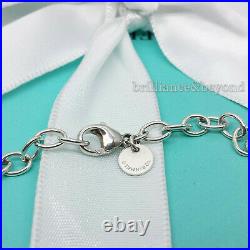 Tiffany & Co. Infinity Charm Bracelet 925 Sterling Silver Chain Authentic 7.75