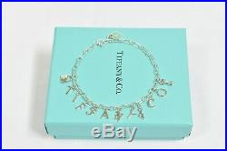 Tiffany & Co. Love Notes Dangle Charm Bracelet Sterling Silver Enamel Size Small