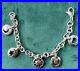 Tiffany-Co-Multi-Charm-Bracelet-Sterling-Silver-Rare-Discontinued-01-dpsx