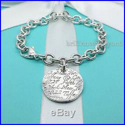 Tiffany & Co. New York Fifth Ave Notes Round Tag Charm Bracelet 925 Silver