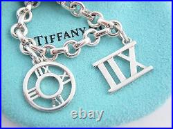 Tiffany & Co Silver Atlas Roman Numerals Charm Donut Link Chain Bracelet Bangle