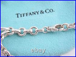 Tiffany & Co Silver Atlas Roman Numerals Charm Donut Link Chain Bracelet Bangle