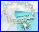 Tiffany-Co-Silver-Hibiscus-Open-Flower-Charm-7-55-Chain-Bracelet-and-Pouch-01-hi