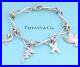 Tiffany-Co-Silver-Picasso-Dove-Heart-Kiss-Scribble-Charm-Bracelet-Rare-x7316-01-gnq