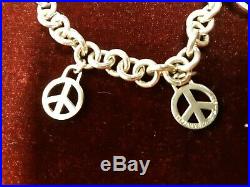 Tiffany & Co. Sterling Silver 925 Charm Bracelet 8 inches Long Peace Sign Charms