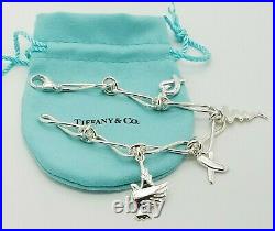 Tiffany & Co Sterling Silver 925 Paloma Picasso 4 Charm Twist Link Bracelet 7.5