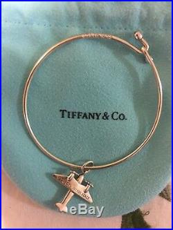 Tiffany & Co. Sterling Silver Bangle Bracelet With Airplane Charm. Authentic