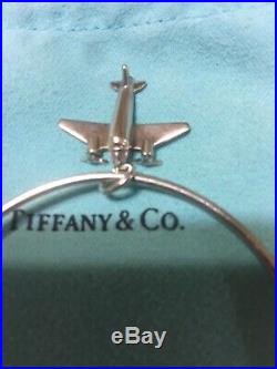 Tiffany & Co. Sterling Silver Bangle Bracelet With Airplane Charm. Authentic