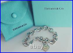 Tiffany Co Sterling Silver Charm Bracelet with Tiffany Co Heart Padlock Charm