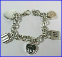 Tiffany & Co Sterling Silver Heart Charm Bracelet With 4 Mini Lock Pendants 7.5