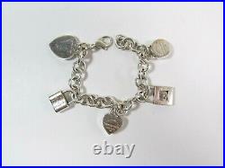 Tiffany & Co Sterling Silver Heart Charm Bracelet With 4 Mini Lock Pendants 7.5