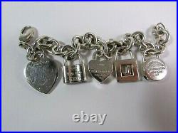 Tiffany & Co Sterling Silver Heart Charm Bracelet With 4 Mini Lock Pendants 7.5