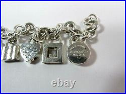 Tiffany & Co Sterling Silver Heart Charm Bracelet With 4 Mini Lock Pendants 7.5