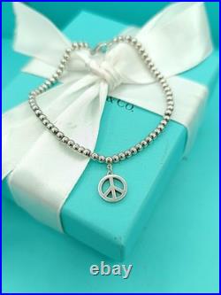 Tiffany & Co Sterling Silver Peace Charm On Mini Bead Bracelet 6.75 Very Rare Tiffany & Co Sterling Silver Peace Charm On Mini Bead Bracelet 6.75 Very Rare