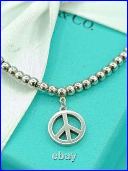 Tiffany & Co Sterling Silver Peace Charm On Mini Bead Bracelet 6.75 Very Rare Tiffany & Co Sterling Silver Peace Charm On Mini Bead Bracelet 6.75 Very Rare