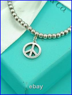 Tiffany & Co Sterling Silver Peace Charm On Mini Bead Bracelet 6.75 Very Rare Tiffany & Co Sterling Silver Peace Charm On Mini Bead Bracelet 6.75 Very Rare