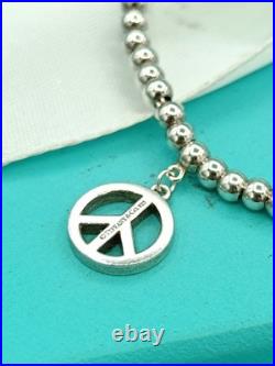 Tiffany & Co Sterling Silver Peace Charm On Mini Bead Bracelet 6.75 Very Rare Tiffany & Co Sterling Silver Peace Charm On Mini Bead Bracelet 6.75 Very Rare