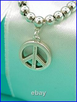 Tiffany & Co Sterling Silver Peace Charm On Mini Bead Bracelet 6.75 Very Rare Tiffany & Co Sterling Silver Peace Charm On Mini Bead Bracelet 6.75 Very Rare