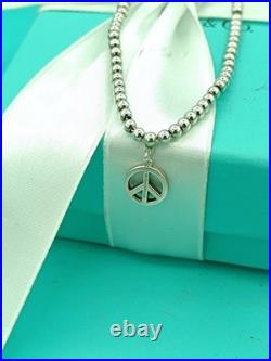 Tiffany & Co Sterling Silver Peace Charm On Mini Bead Bracelet 6.75 Very Rare Tiffany & Co Sterling Silver Peace Charm On Mini Bead Bracelet 6.75 Very Rare