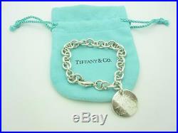 Tiffany & Co. Sterling Silver Round Disc Tiffany Notes Charm Bracelet 6.75