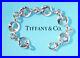 Tiffany-Co-Sterling-Silver-Stencil-Pierced-Heart-Charm-Bracelet-01-nsm