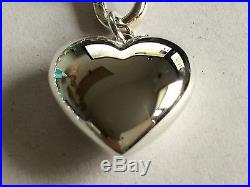Tiffany & Co sterling silver 7.25 oval clasping end links bracelet heart charm