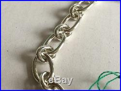 Tiffany & Co sterling silver 7.25 oval clasping end links bracelet heart charm