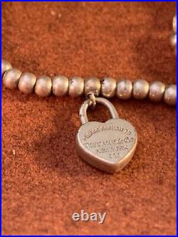 Tiffany Sterling Silver Bracelet with 7 ball chain and Heart-shaped Lock Charm
