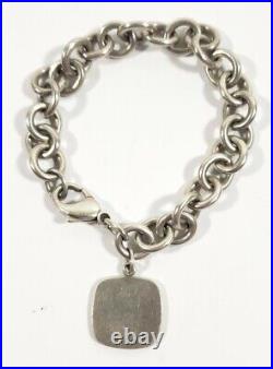 Tiffany Sterling Silver Bracelet with Men's Warehouse Service Charm 18K & Silver