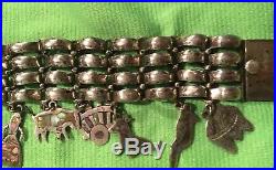 Unique Vintage Taxco Mexican Silver Bracelet with 11 Silver and Abalone Charms