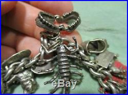 VINTAGE 1940's STERLING SILVER CHARM BRACELET with20 CHARMS, SOME HIDDEN SURPRISES